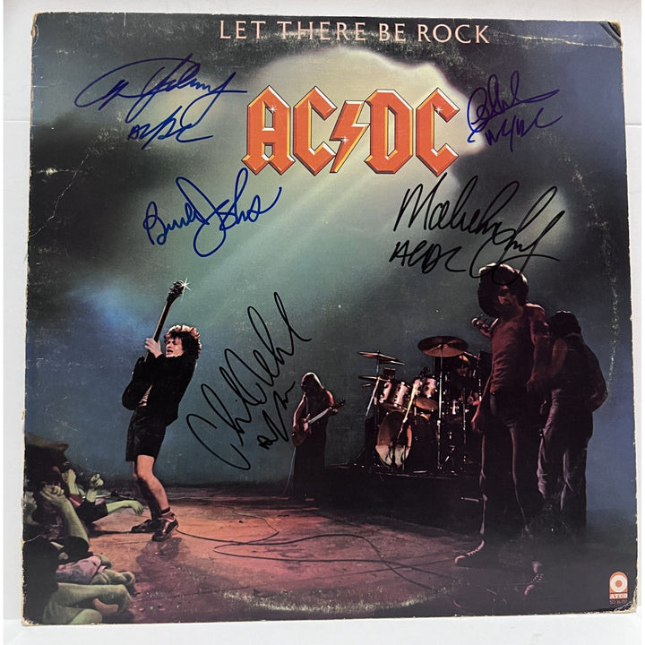 Angus and Malcolm Young Cliff Williams Brian Johnson Phil Rudd AC DC "Let there be rock" LP signed with proof