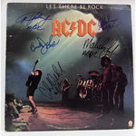 Load image into Gallery viewer, Angus and Malcolm Young Cliff Williams Brian Johnson Phil Rudd AC DC &quot;Let there be rock&quot; LP signed with proof
