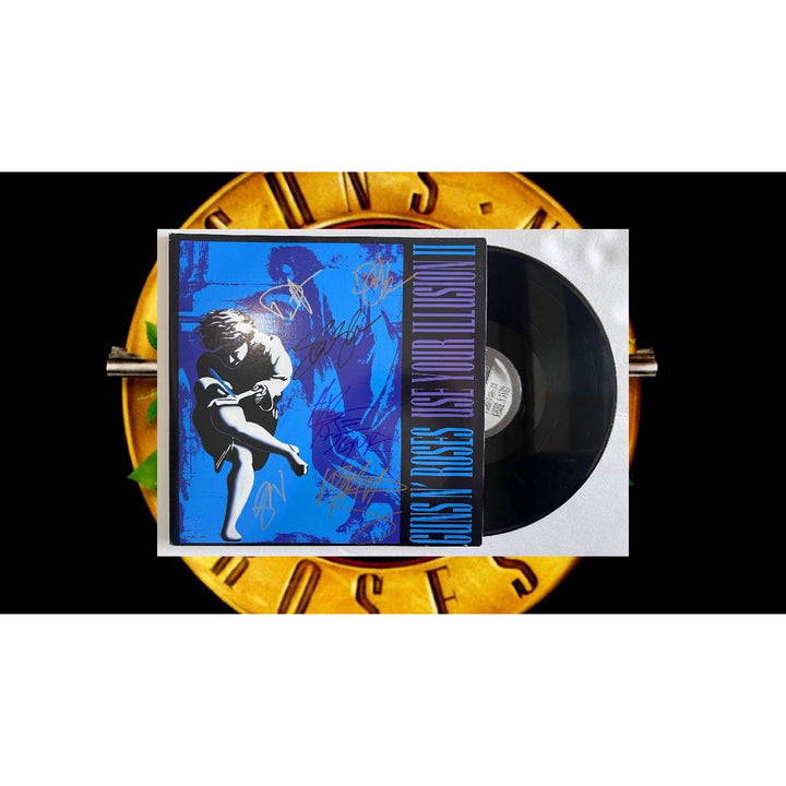 Guns n Roses, W. Axl Rose, Slash, Izzy Stradlin Use your Illusion II album signed with proof