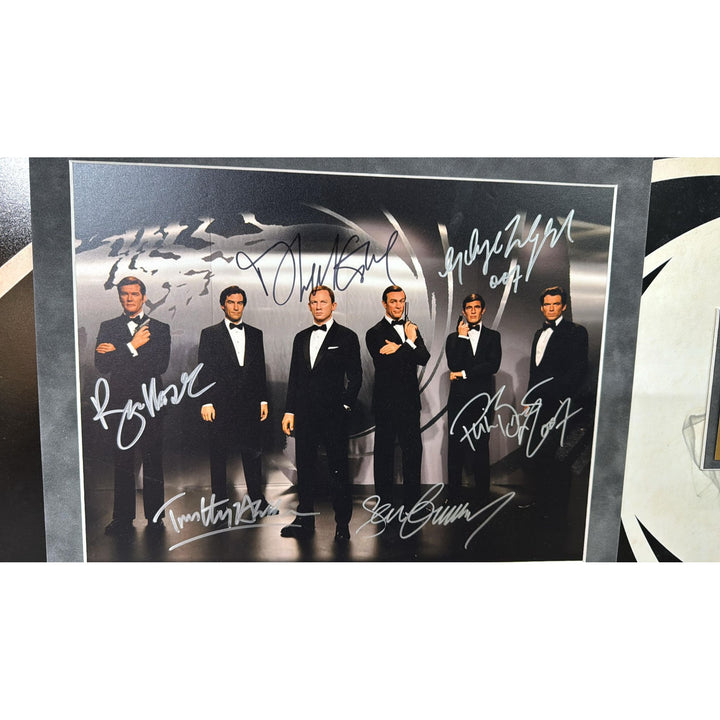 James Bond 007 11x14 photo Sean Connery, Roger Moore, Pierce Brosnan, George Lazenby, Timothy Dalton, Daniel Craig signed with proof