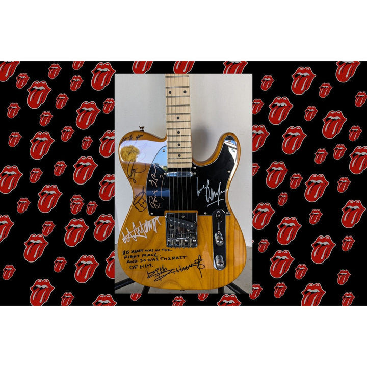 Rolling Stones telecaster electric guitar signed by Mick, Keith, Charlie,Ronnie and Bill with lyrics and sketches incredible!