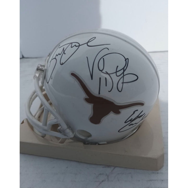 Texas Longhorns Priest Holmes Vince Young Earl Campbell Riddell mini helmet signed with proof Awesome Artifacts