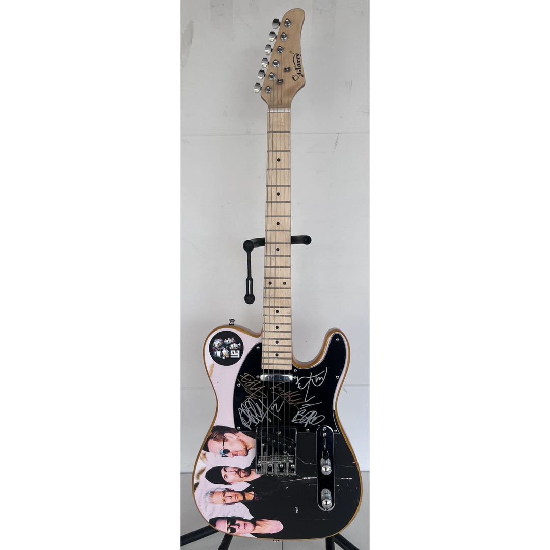 Bono The Edge Larry Mullen Adam Clayton U2 Logo Telecaster full size electric guitar signed with proof.