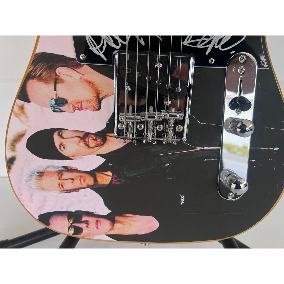 Bono The Edge Larry Mullen Adam Clayton U2 Logo Telecaster full size electric guitar signed with proof.