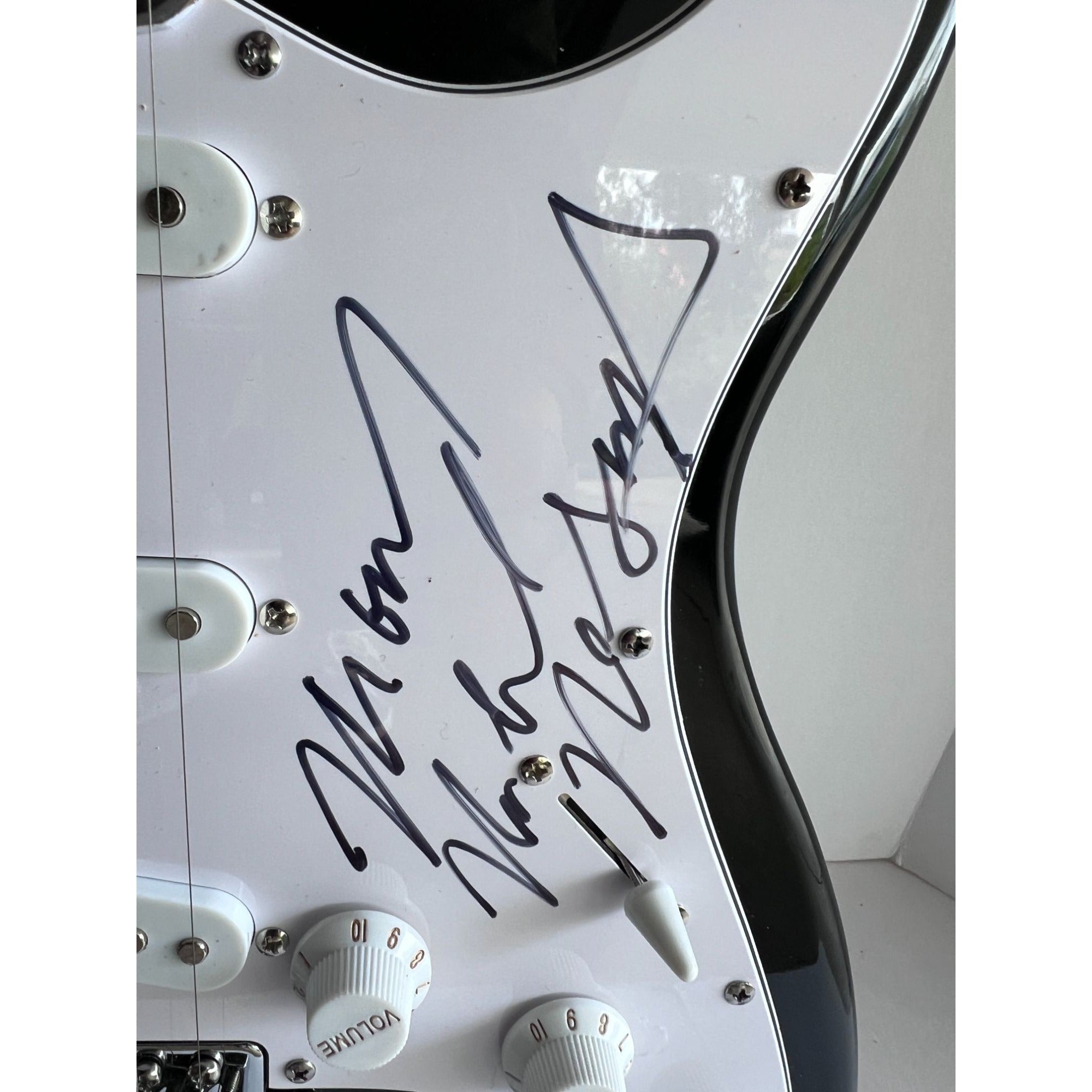 The Monkees Michael Nesmith, Peter Tork, Micky Dolenz, and Davey Jones full size Stratocaster electric guitar signed with proof