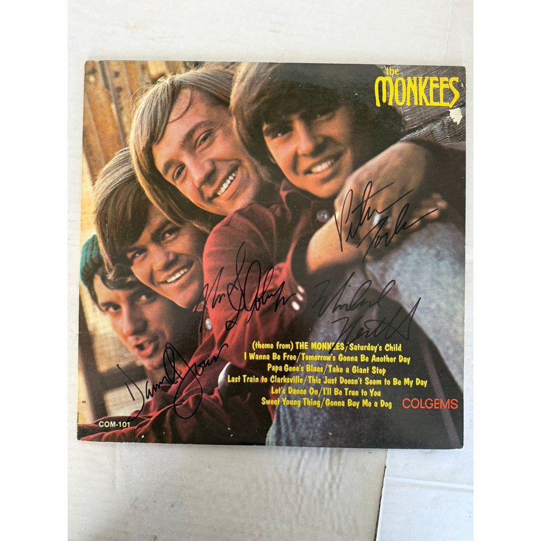 The Monkees Peter Tork, Mike Nesmith, David Jones, Micky Dolenz original album LP signed with proof.