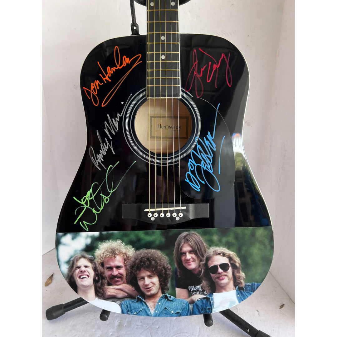 The Eagles Bernie Laden Joe Walsh Don Henley Glenn Frey Randy Meisner signed and inscribed full size acoustic guitar with proof