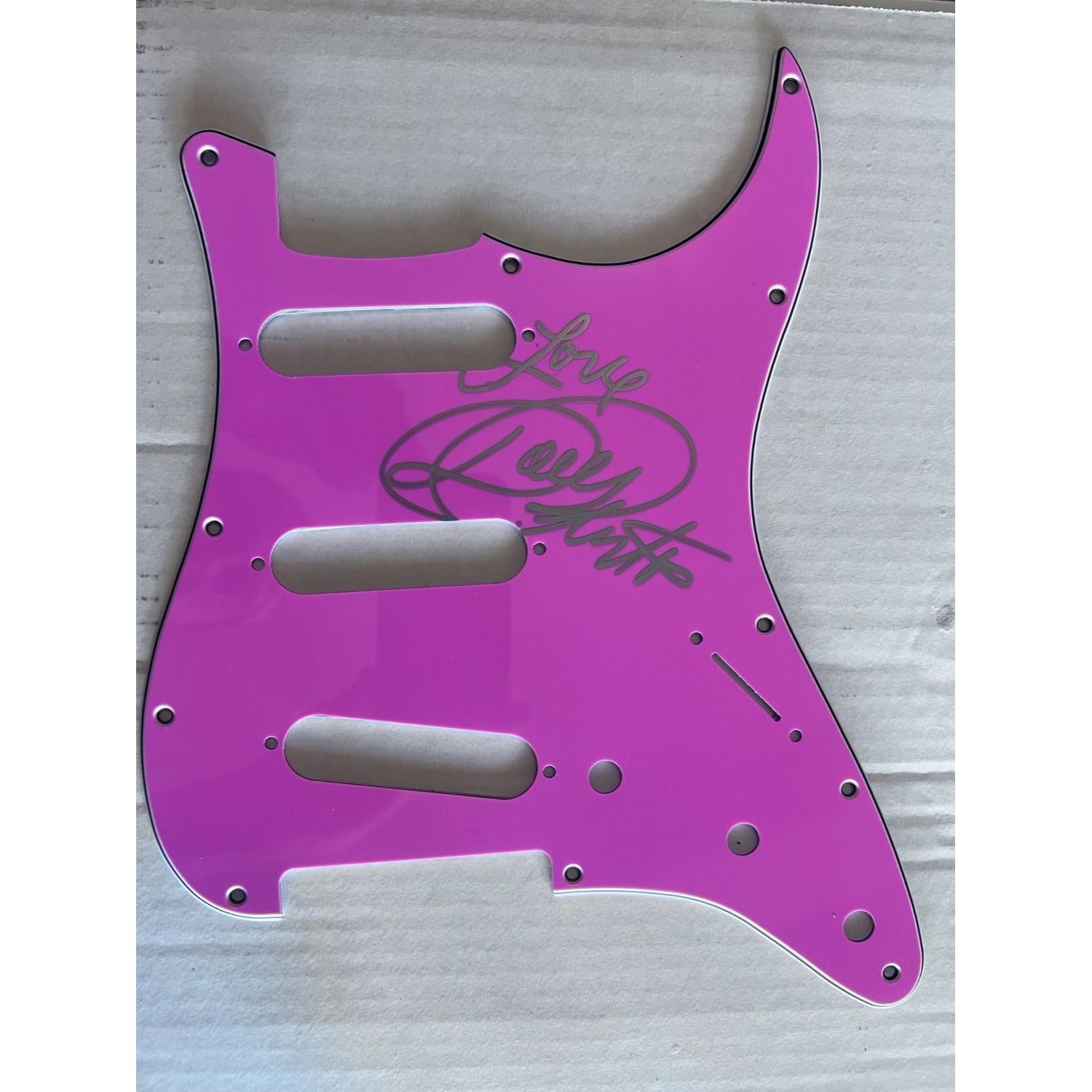 Dolly Parton and Kenny Rogers Fender Stratocaster electric guitar pickguard signed with proof