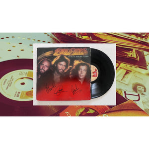 Barry, Robin and Maurice Gibb the Bee Gees Spirits Having Flown original LP signed with proof