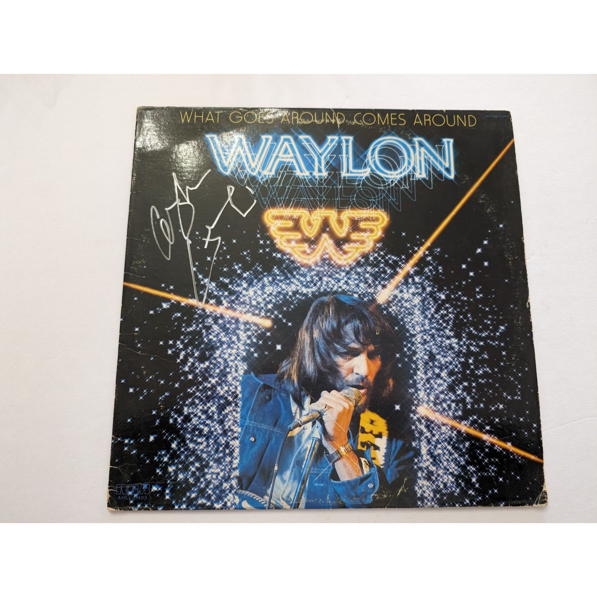 Waylon Jennings what goes around comes around original LP signed with proof