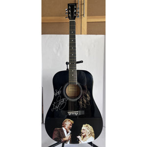 Kenny Rogers and Dolly Parton full size acoustic guitar signed with proof