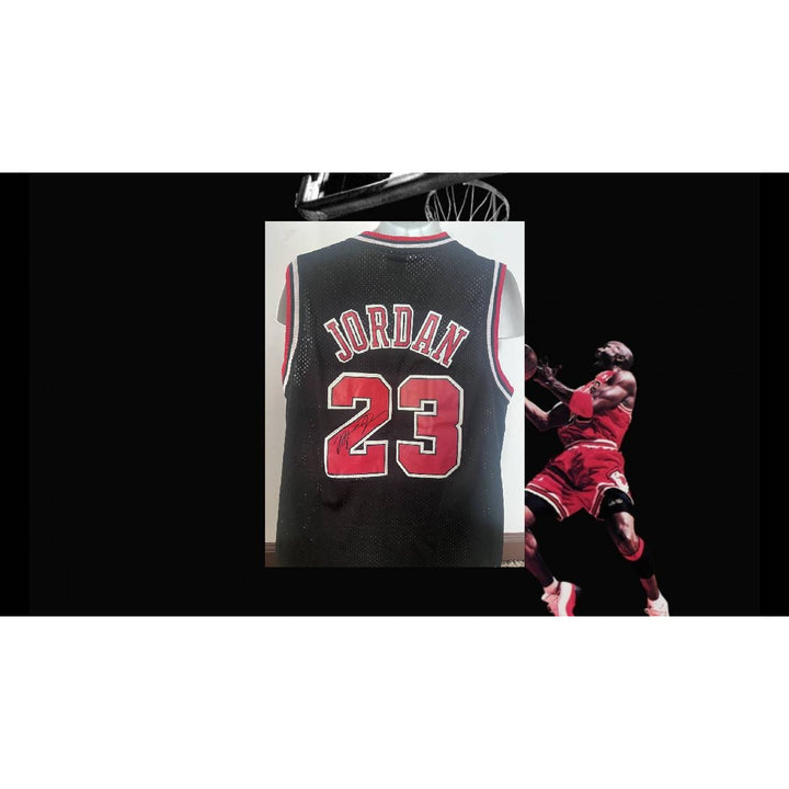 Michael Jordan black jersey size large signed with proof