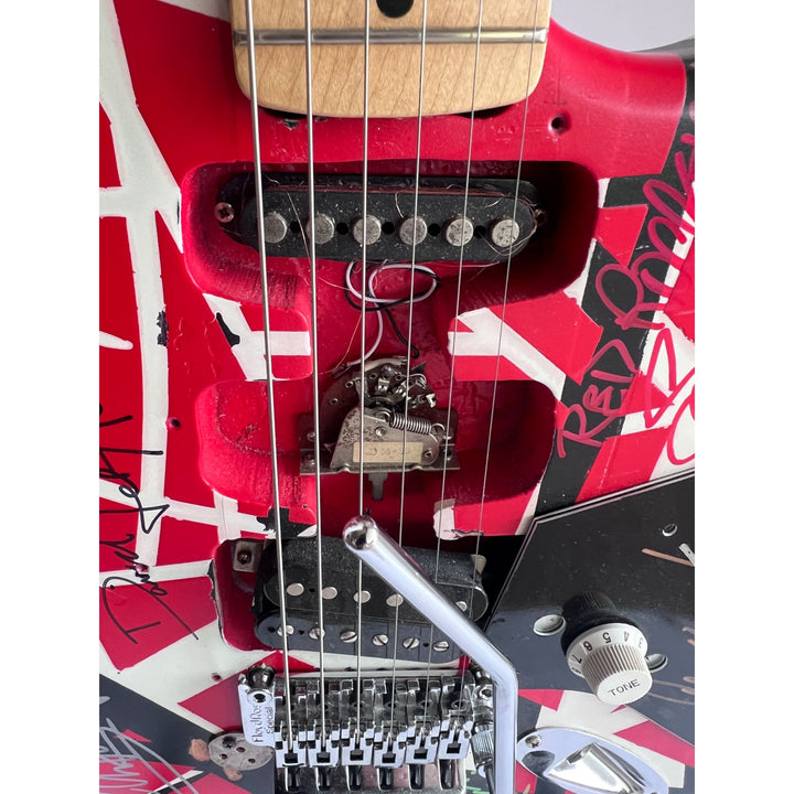 Eddie Van Halen Frankenstein Fender Stratocaster electric guitar signed by David Lee Roth Eddie Van Halen Michael Anthony Sammy Hagar