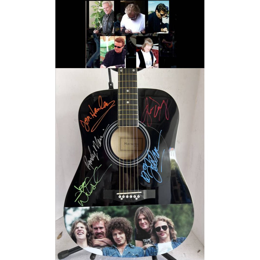 The Eagles Bernie Laden Joe Walsh Don Henley Glenn Frey Randy Meisner signed and inscribed full size acoustic guitar with proof