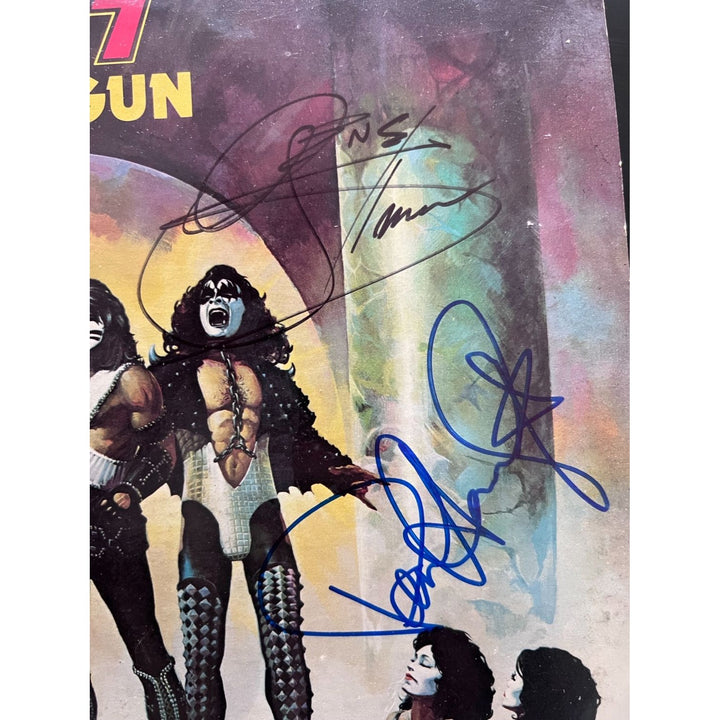 Kiss, Gene Simmons, Paul Stanley, Peter Chris, Ace Frehley Love Gun original lp signed with proof