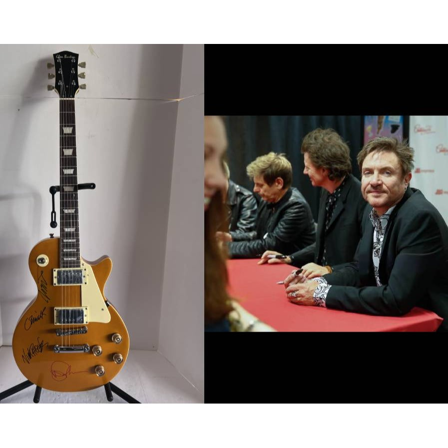 Duran Duran Simon Le Bon, John Taylor, Nick Rhodes Roger Taylor and Andy Taylor les paul electric guitar signed whit proff
