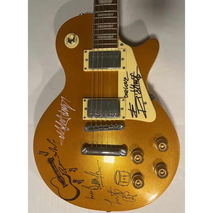 The Rolling Stones Mick Jagger Bill Wyman Mick Taylor Ronnie Wood Keith Richards signed and inscribed one full size Les Paul electric guitar