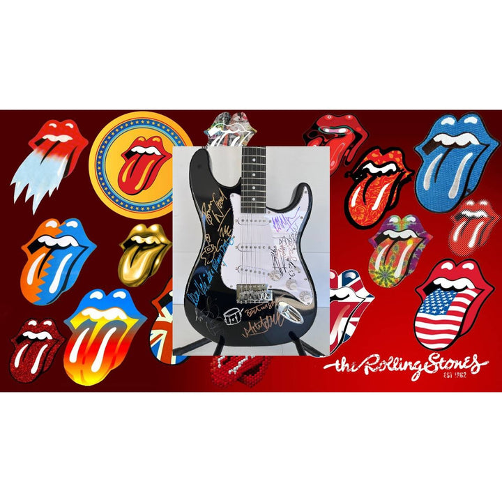 The Rolling Stones Mick Jagger Bill Wyman Mick Taylor Ronnie Wood Keith Richards electric guitar signed and inscribed with proof.