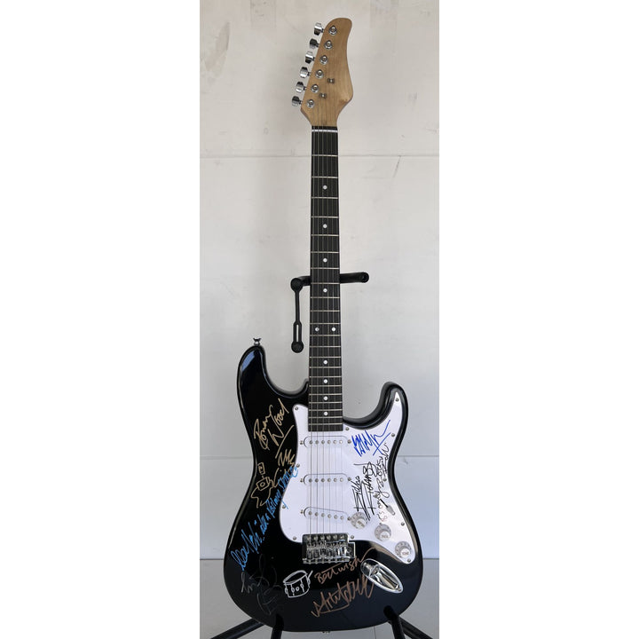 The Rolling Stones Mick Jagger Bill Wyman Mick Taylor Ronnie Wood Keith Richards electric guitar signed and inscribed with proof.