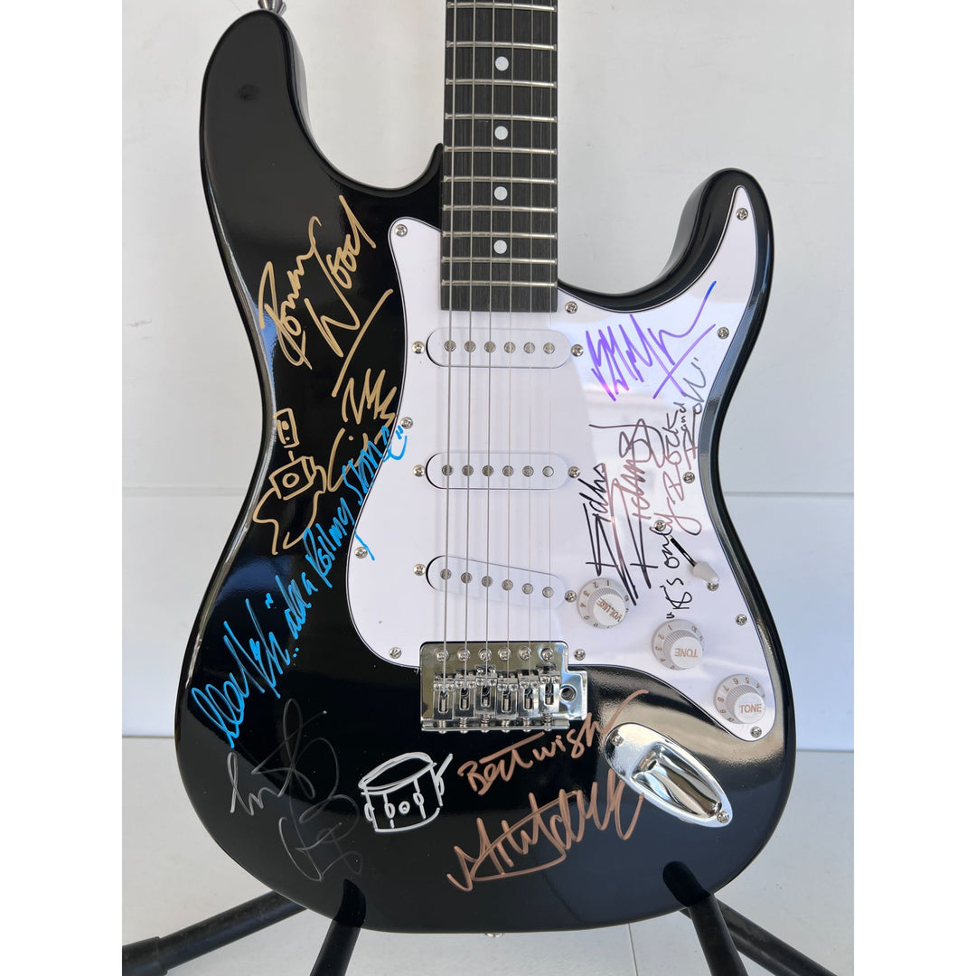 The Rolling Stones Mick Jagger Bill Wyman Mick Taylor Ronnie Wood Keith Richards electric guitar signed and inscribed with proof.