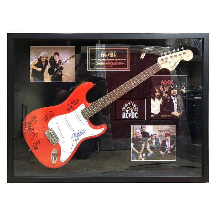 The Monkees Michael Nesmith, Peter Tork, Micky Dolenz, and Davey Jones full size Stratocaster electric guitar signed with proof