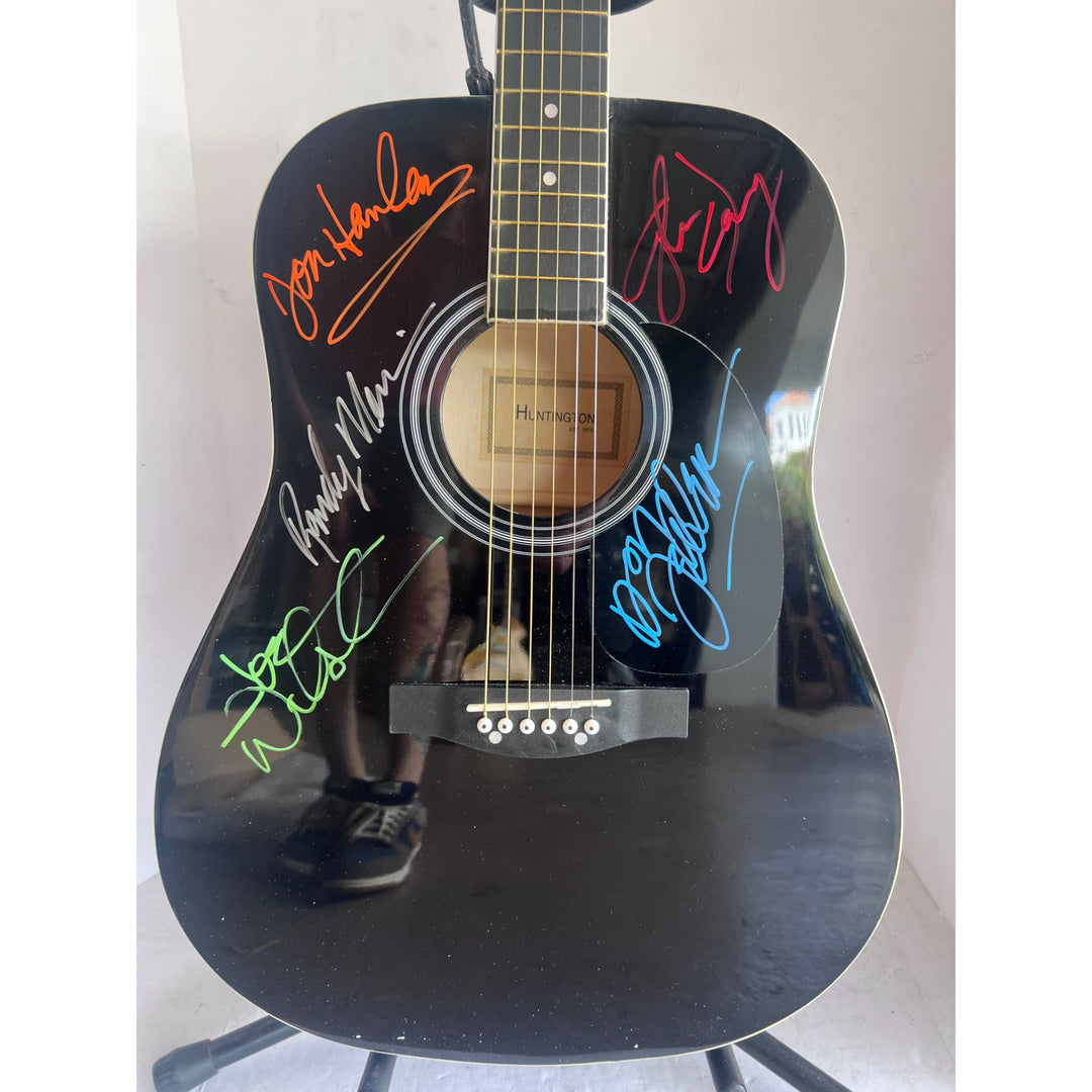 The Eagles Bernie Laden Joe Walsh Don Henley Glenn Frey Randy Meisner signed and inscribed full size acoustic guitar with proof