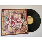 Load image into Gallery viewer, Greg and Dwayne Allman Dickey Betts and Enlightened Rogues lp signed with proof
