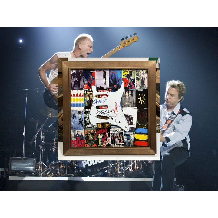 The Police "Sting" Gordon Sumner,  Andy Summer, Stewart Copeland Stratocaster electric guitar pickguard signed with proof and museum quality