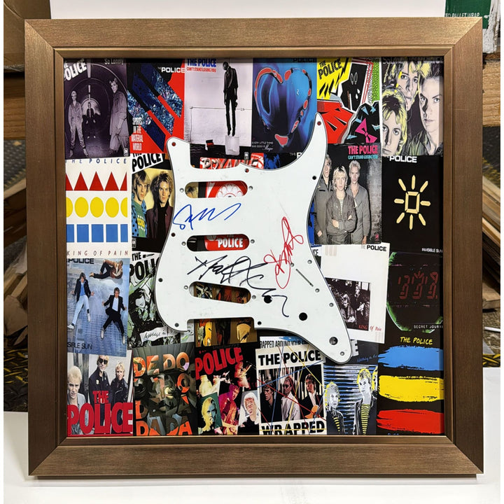 The Police "Sting" Gordon Sumner,  Andy Summer, Stewart Copeland Stratocaster electric guitar pickguard signed with proof and museum quality