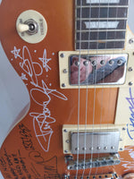 Load image into Gallery viewer, Kiss Gene Simmons, Paul Stanley, Ace Frehley, Peter Criss, Tommy Thayer, Eric Singer, Vinny Vincent and Bruce Kulick Les Paul electric guitar signed with proof
