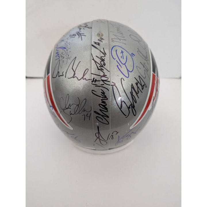 New England Patriots Tom Brady Adam Troy Brown Mike Vrabel Teddy Bruschi Bill Belichick Super Bowl champions 2001 Riddell team signed helmet