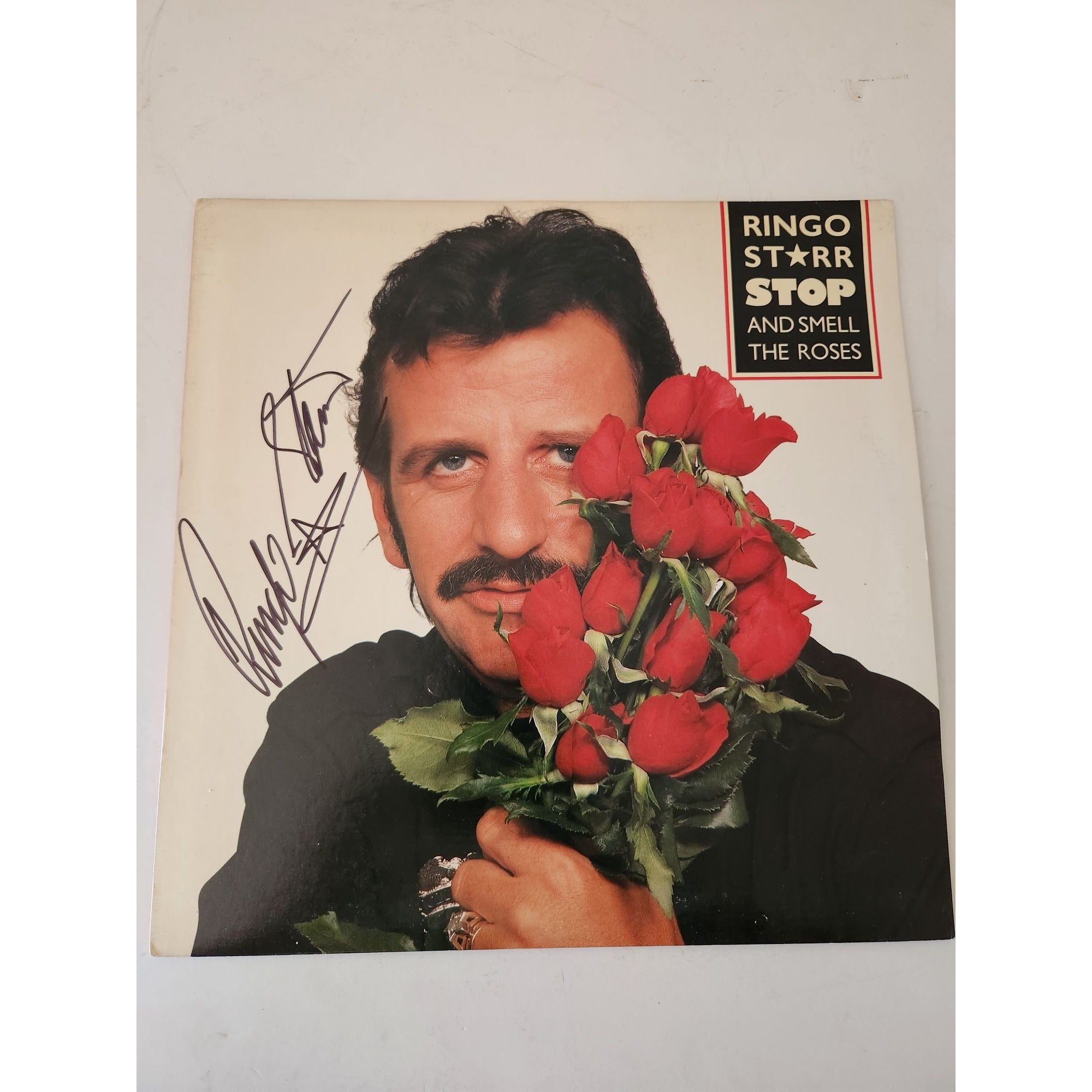 Ringo Starr stop and smell the roses LP signed with proof