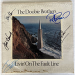 Load image into Gallery viewer, The Doobie Brothers Living on the fault line 1977 LP Michael McDonald Tom Johnston Patrick Simmons signed with proof
