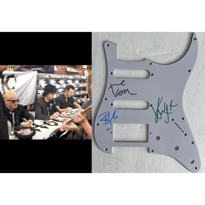 Green Day Billy Joe Armstrong Mike Dirnt and Tre Cool Fender Stratocaster electric guitar pickguard signed with proof