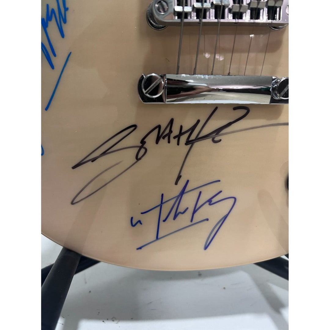 Scorpions Mikkey Dee, Matthias Jabs, Klaus Meine, Rudolf Schenker  lighting full size electric guitar signed with proof