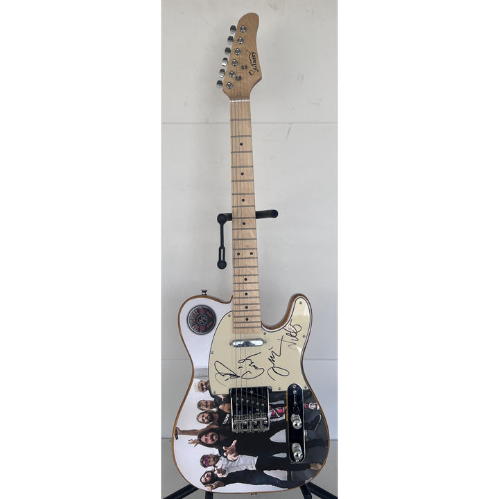 David Grohl Taylor Hawkins Foo Fighters  one of a kind full size electric guitar signed with proof.
