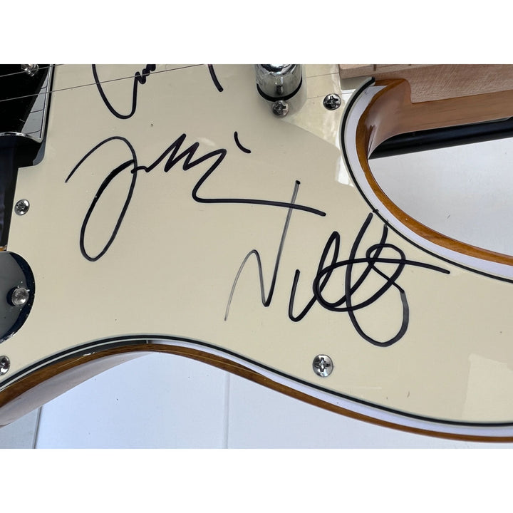 David Grohl Taylor Hawkins Foo Fighters  one of a kind full size electric guitar signed with proof.