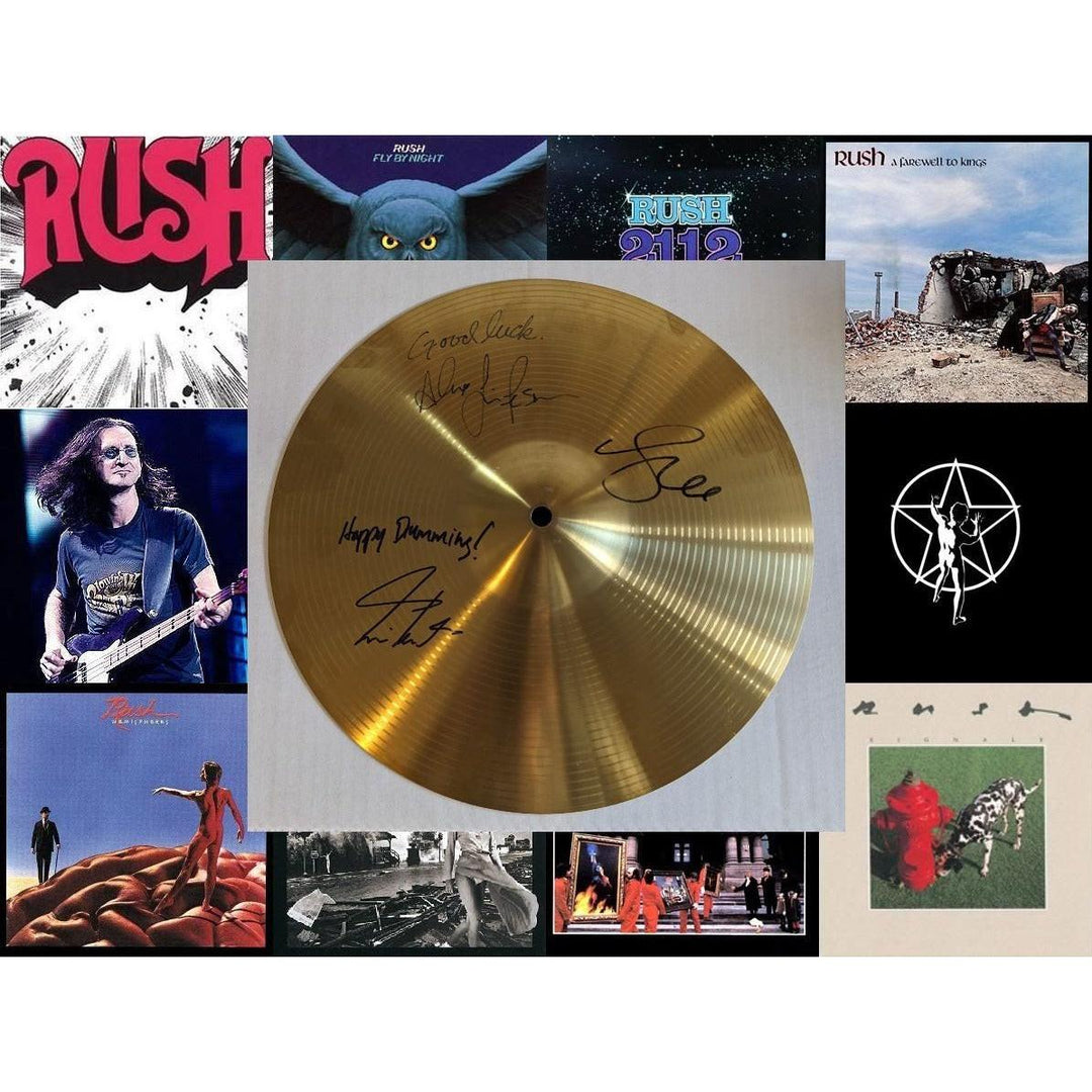 Collage of Rush album covers with a signed, gold cymbal in the center.