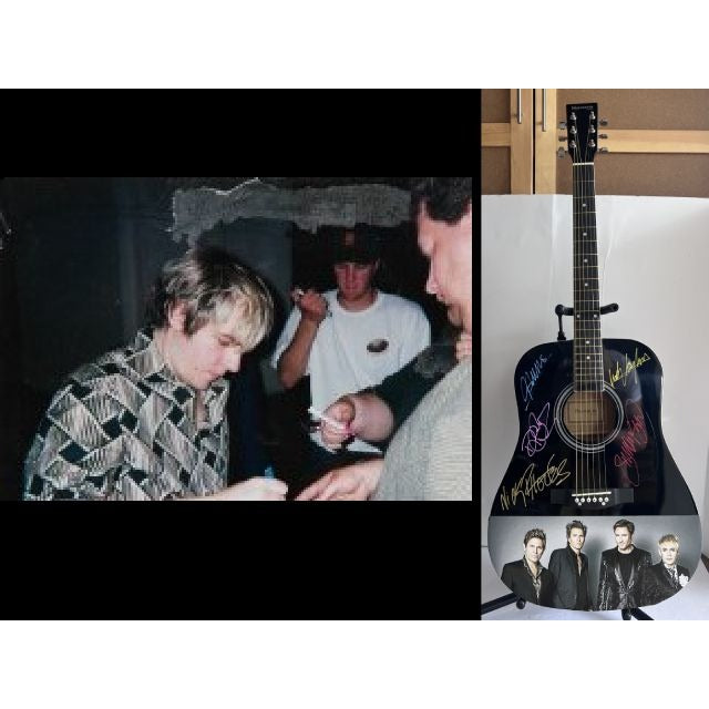 Duran Duran, Simon Le Bon, John, Roger & Andy Taylor, Nick Rhodes One of A kind 39' inch full size acoustic guitar signed with proof