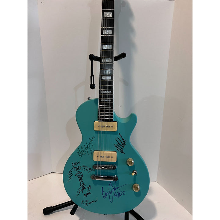 AC/DC Angus Young Brian Johnson Malcolm Young Phil Rudd Les Paul electric guitars signed with proof