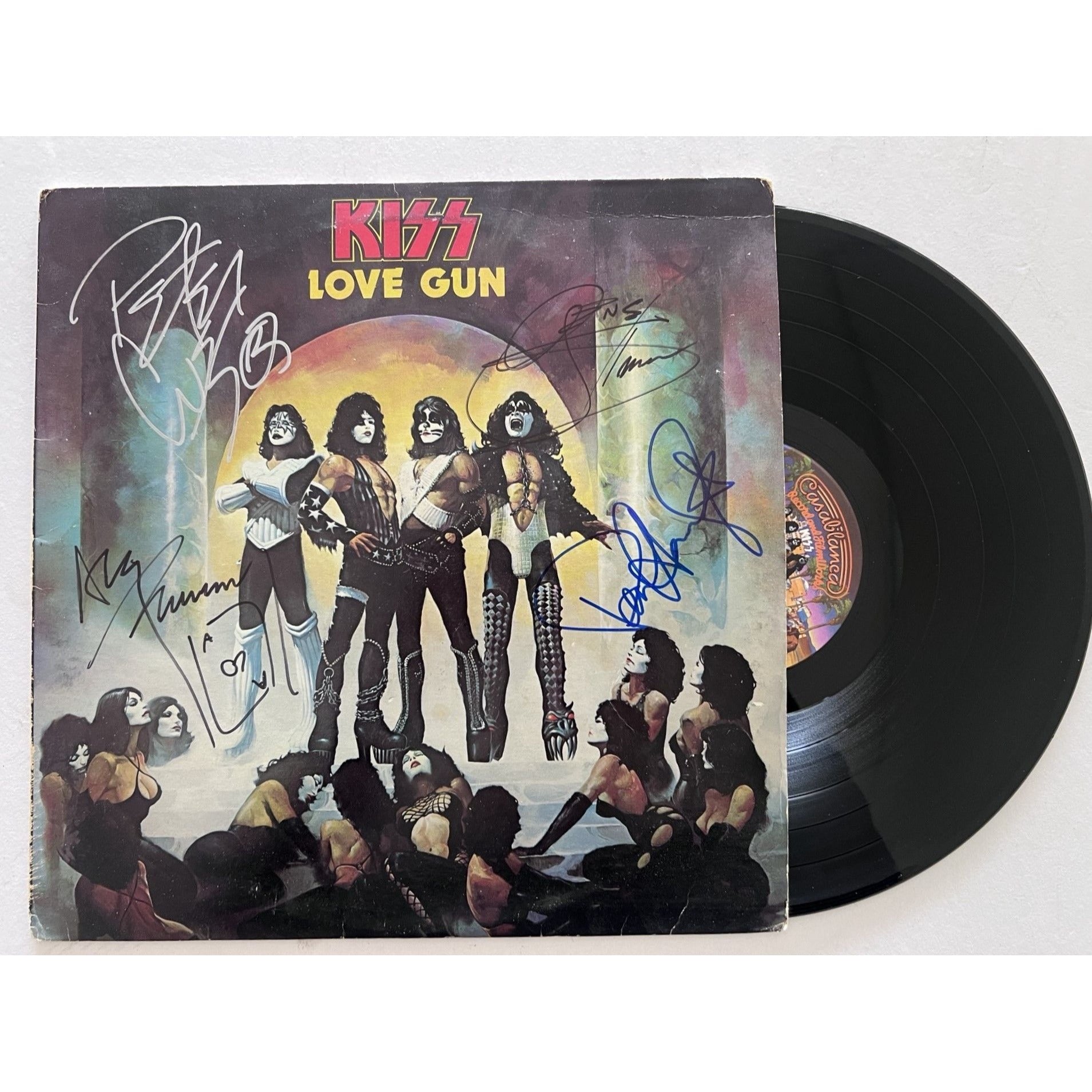 Kiss, Gene Simmons, Paul Stanley, Peter Chris, Ace Frehley Love Gun original lp signed with proof