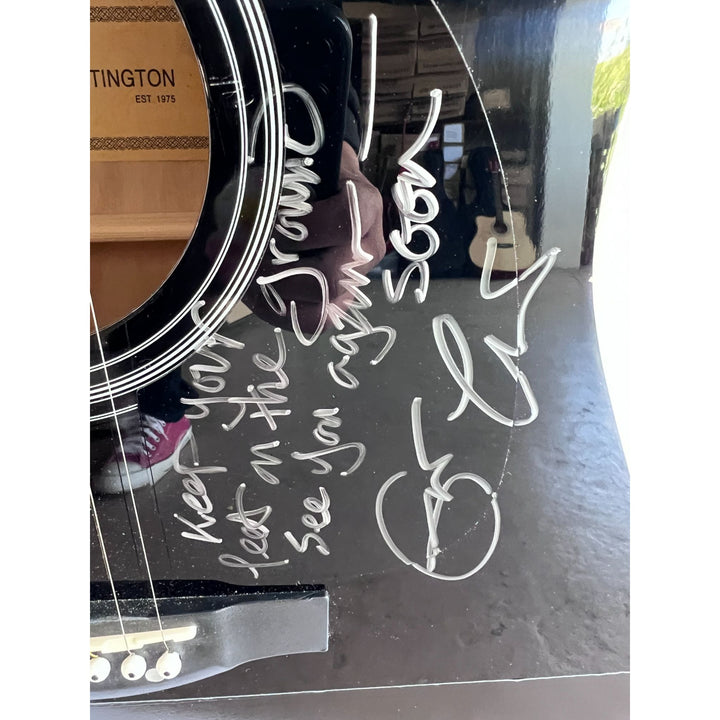 Eric Clapton incredible signed and inscribed "keep your feet on the ground see you soon" full size acoustic guitar one of a kind