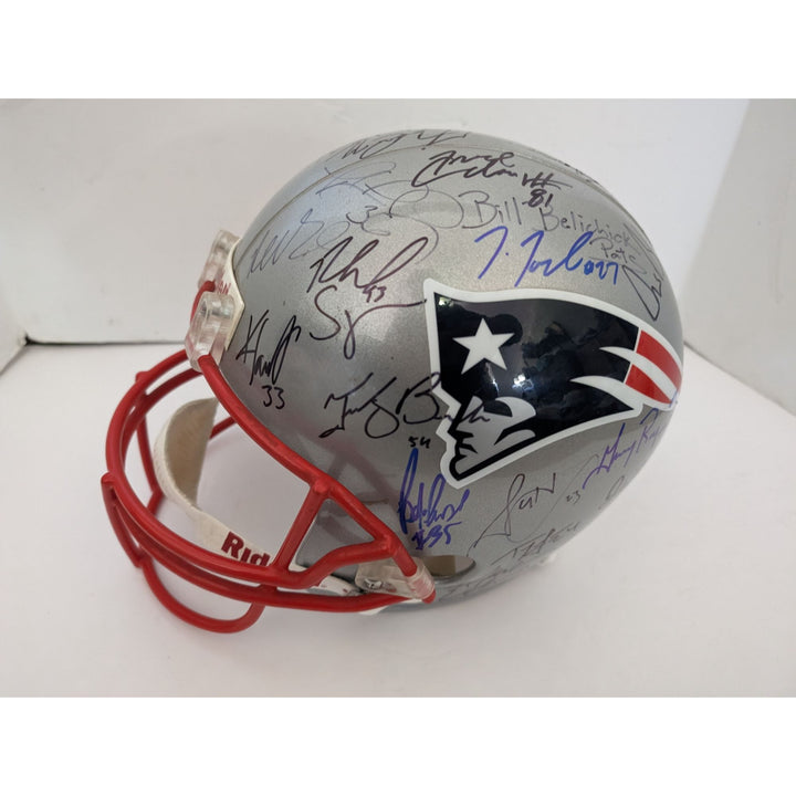 New England Patriots Tom Brady Adam Troy Brown Mike Vrabel Teddy Bruschi Bill Belichick Super Bowl champions 2001 Riddell team signed helmet