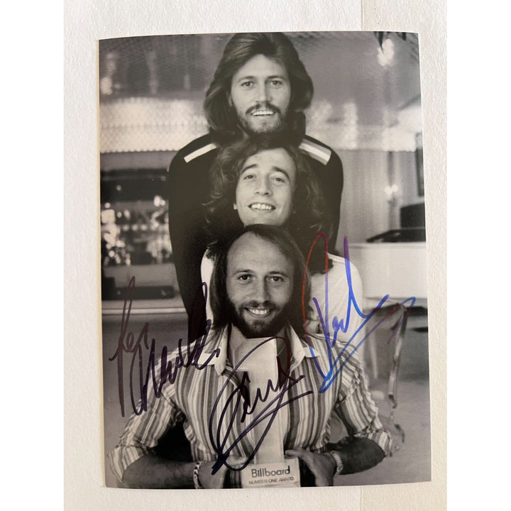 Barry, Robin and Maurice Gibb the Bee Gees 5x7 photo signed with proof