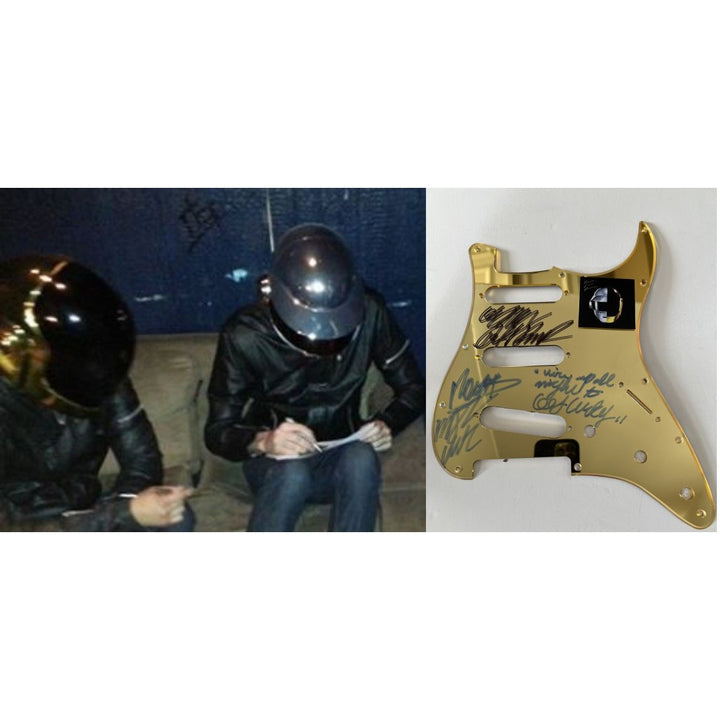 Daft Punk Thomas Bangalter and Guy-Manuel de Homem-Christo of 'Daft Punk' electric guitar pickguard signed with proof