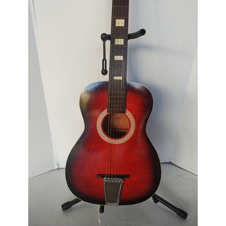 Lynyrd Skynyrd vintage full size acoustic guitar signed with proof Awesome Artifacts