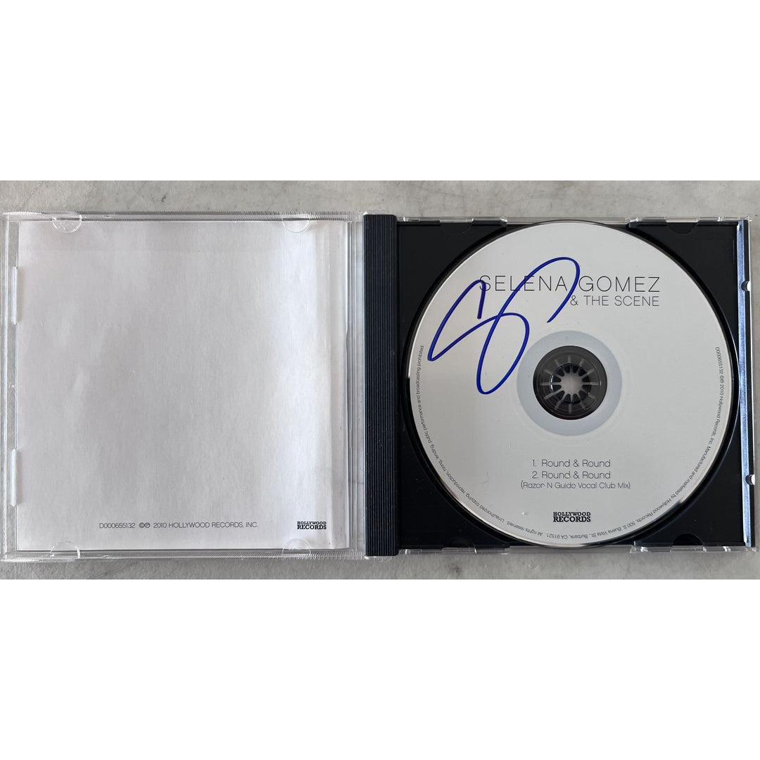 Selena Gomez CD and cover signed with proof