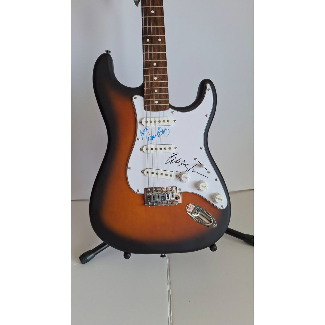 Bob Dylan and Joan Baez, authentic Fender Stratocaster electric guitar signed with proof