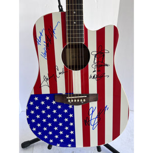 Johnny Cash Waylon Jennings Kris Kristofferson Willie Nelson The Highwaymen USA American flag acoustic guitar signed with proof