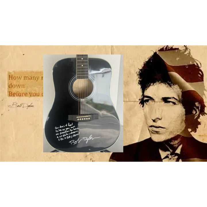 Bob Dylan acoustic guitar signed with lyrics and signing proof.